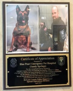 Honorary plaque of K9 Officer Indi and his handler for exceptional services provided by BluePearl Associates in Georgia.