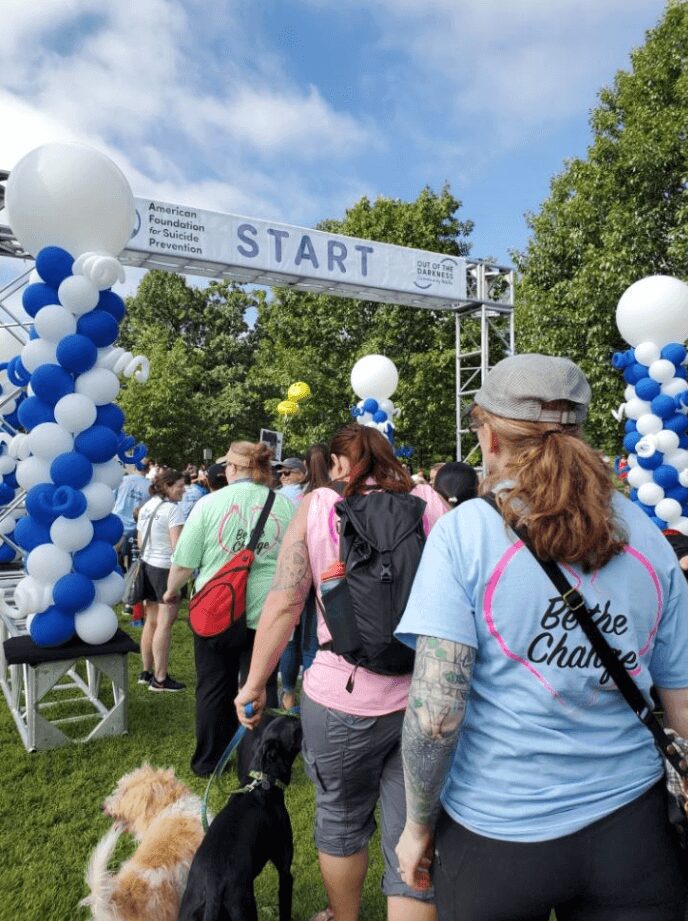 Walkers begin the walk at the starting line.