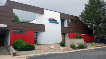 BluePearl Pet Hospital is an emergency veterinary hospital located in Lakewood, CO, outside of Denver. The outside of the hospital is pictured.