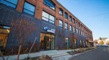 BluePearl Pet Hospital in Charlestown, MA has brick exterior and modern doorway.