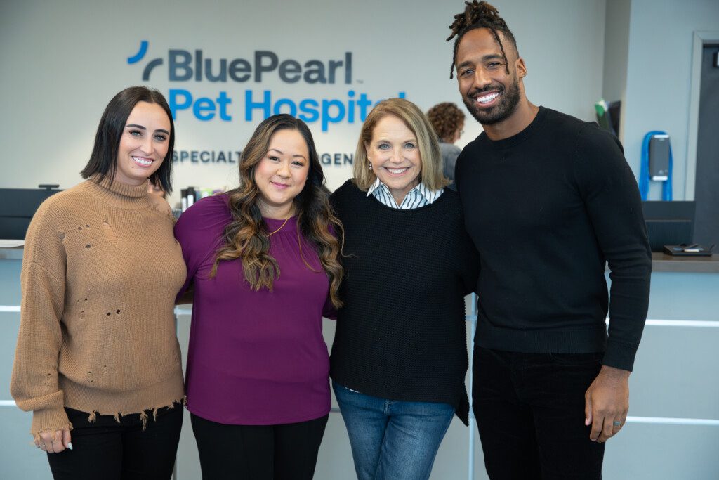 People pose together for a photo. From left to right is Ashley Ryan, Pauline Bell, KAtie Couric, and Logan Ryan.